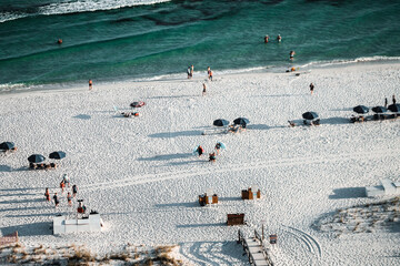 Over view shots of the white sands and blue water of Navarre Beach in Florida. 