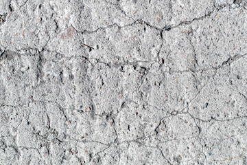 Background, texture, concrete of the old floor with cracks.