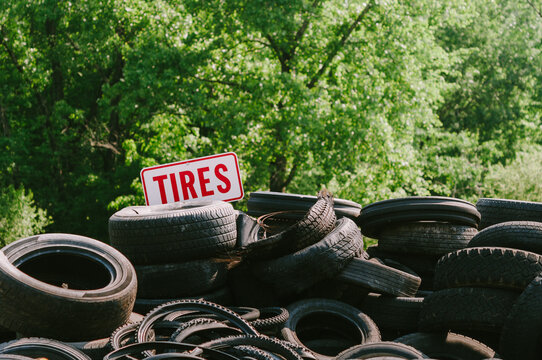 Pile of worn used automobile and bicycle tires at the dump
