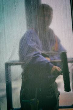 Window washer cleaning with brush