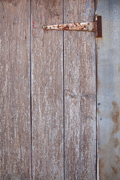 close up on old tin and wooden shed