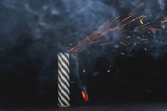 Firecracker right before it explodes