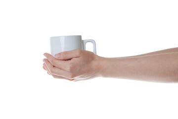 a hand wrapped around a white cup of coffee.