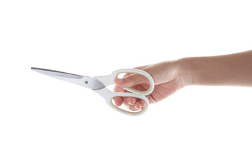 hand holding scissors.