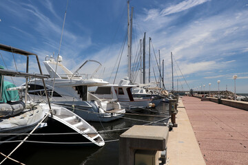 Fototapeta premium Boats moored at the yacht club pier