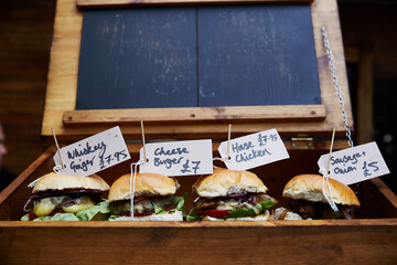 Handmade burgers on street food market
