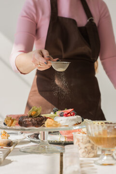Woman Cooking Donuts