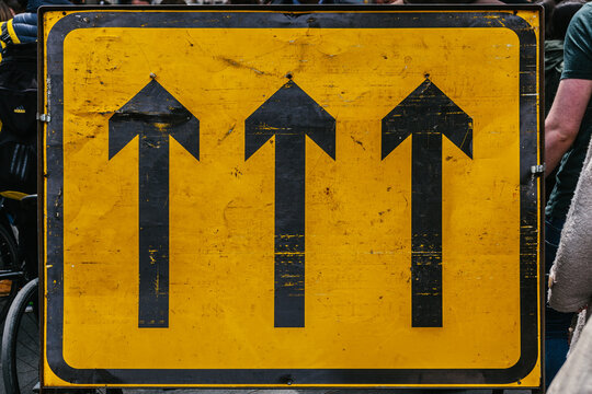 Yellow Road Sign with 3 Arrows
