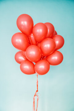 Red balloons on blue background