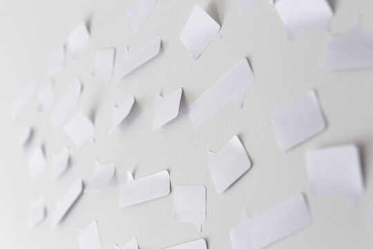 Speech Bubbles on a White Wall