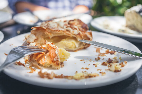 Breakfast croissant, pastry and coffee.