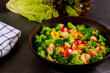 Colorful vegetable keto diet dish with chicken meat.