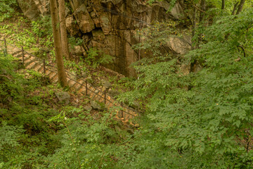 Top down view of stone steps descending mountain
