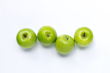 Fototapeta na wymiar Green apples on white background. Copy space