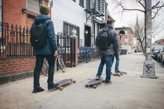 Group of Young Men with Skateboard in Brooklyn, New York City