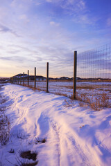 winter landscape with fence