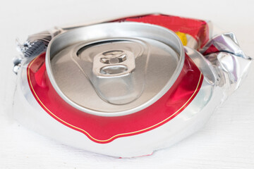 background texture recycle aluminum beer can compression on white 