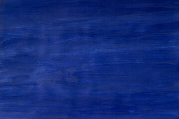 Abstract blue textured background painted with gouache. Hand painted with blue gouache on paper....