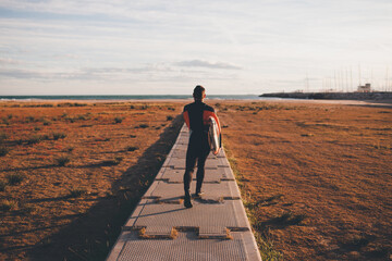Surfer about to get in the water
