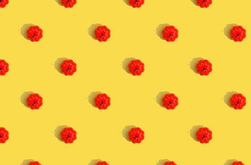 Pumpkin pattern on yellow background with deep shadows.