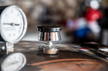 Obraz premium pressure cooker guage and releave valve