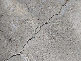 Large Crack Diagonal from Corner to Corner on Concrete Floor or Sidewalk, Damage