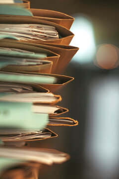 Stack of documents folders on office. Selective focus.