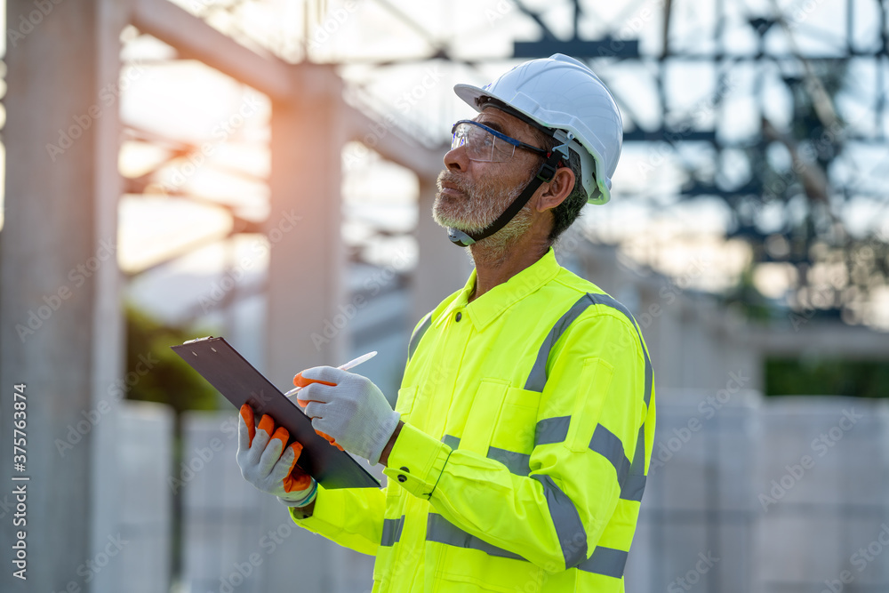 Aufkleber engineer working about project in building construction site.