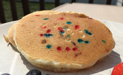 Patriotic Pancakes with Red, White and Blue Sprinkles on a White Plate for Labor Day, Memorial Day, or 4th of July / Independence Day