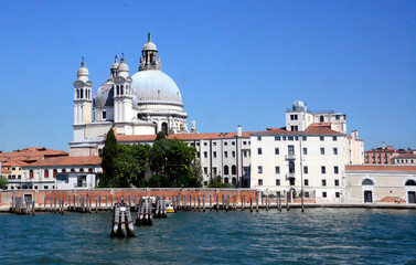 Fototapeta na wymiar Venice domes from the Adriatic sea on a clear blue sky day 