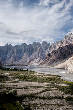 Valley traversed by a river and protected by the mountains