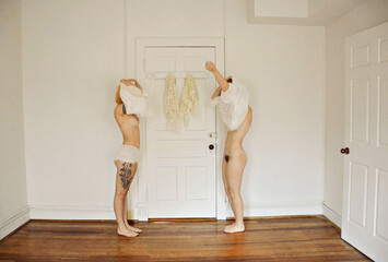 Young ladies getting dressed