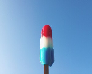 popsicle against blue skey