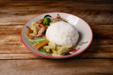 Stir fried mix vegetable with rice Thai food street food