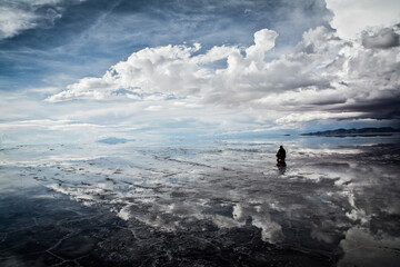 flat uyuni salt and desert , infinite mirror and water 