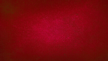 blank red texture surface background with dark corners. red grainy cement wall background with space for text. abstract rustic christmas concept background.