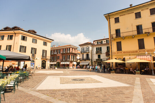 Menaggio. Italy - July 23, 2019: Square in Historic Center of Menaggio on Como Lake. Cafe, Restaurants and Souvenir Shops.