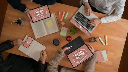 College students doing group assignment with mock up digital devices