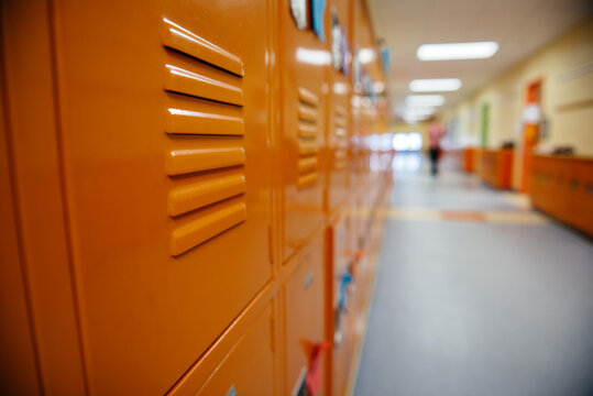 Orange lockers in an elementary school corridor