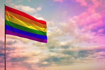 Fluttering Gay Pride flag mockup with the space for your content on colorful cloudy sky background.