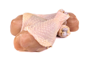 Raw chicken legs isolated on white background