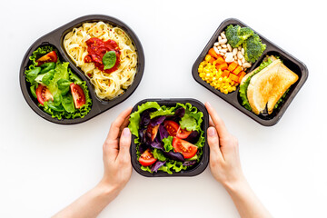 Food delivery background. Take away meal in boxes. Top view