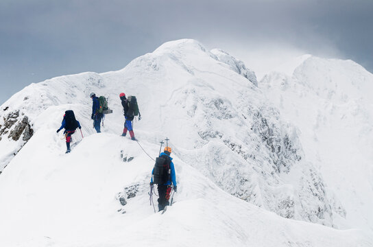 alpinists on the ridge