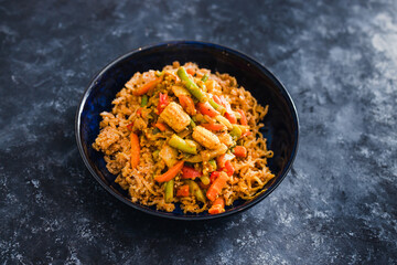 plant-based food, vegan ginger noodls with stir fried veggies in green curry sauce