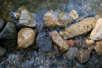 Fototapeta na wymiar Rocks In a River