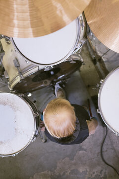 Music lesson - boy at drum set