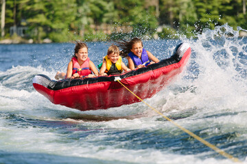 Kids Tubing on a Lake in New Hampshire