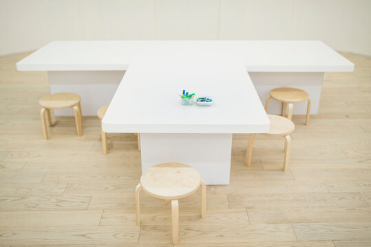 White Table and Small Chairs for Kids
