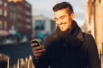 Cool Man checking the cell phone