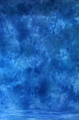 Obraz premium Abstract grungy blue stucco wall background in cold mood. Texture of blue decorative plaster or concrete. Art Rough Stylized Texture Banner With Space For Text. Blue foil background texture.